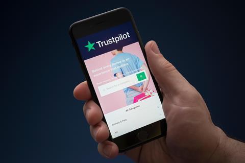 Trustpilot homepage shown on phone screen