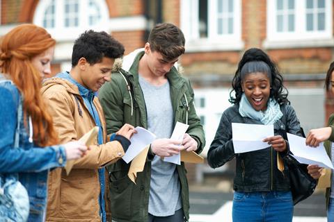 A group of students opening their exam results