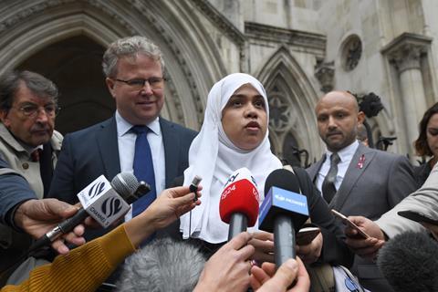 Shelina Begum and husband Mohammed Raqeeb (right) outside the Royal Courts of Justice