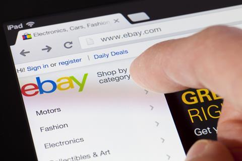 eBay website shown on iPad screen