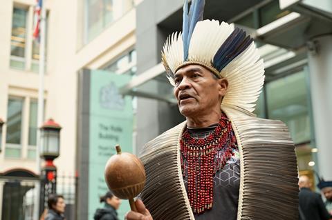 Indigenous Brazilians outside Rolls Building