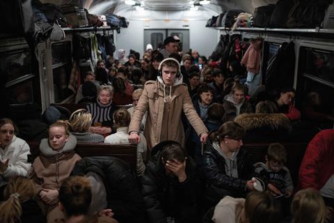 Ukrainian refugees crowd on to a train leaving Lviv for Przemysl, Poland (photo by Tom Nicholson)