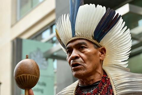 Indigenous Brazilians outside Rolls Building for the opening of Mariana Dam group claim against BHP