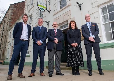 From the left, Nicholson Portnell partners Simon Jewitt, Alan Douglas and Richard Nelson with Cartmell Shepherd director Carol O'Donoghue and Managing Director Peter Stafford.