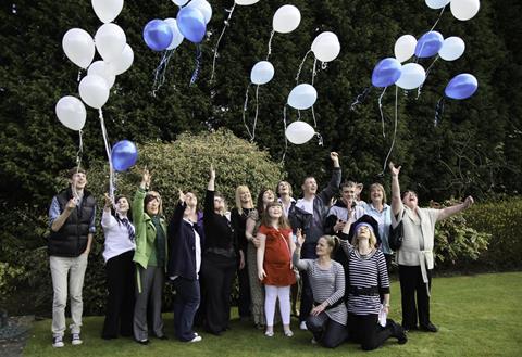 The families after agreeing a settlement with Corby Borough Council in 2010