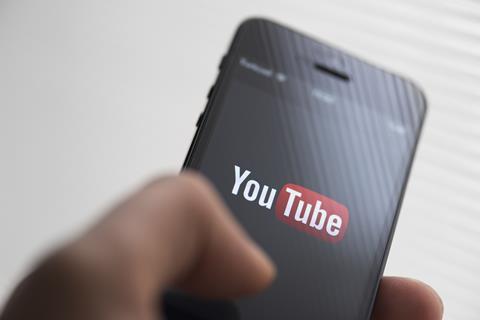 Youtube logo displayd on phone