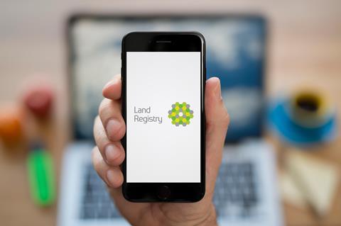 Land Registry logo displayed on phone