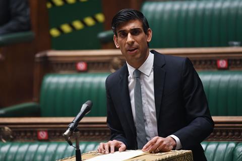 Rishi Sunak reads out his budget statement in the House of Commons