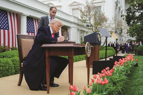 President Trump signs an executive order on the administration’s tariff plans